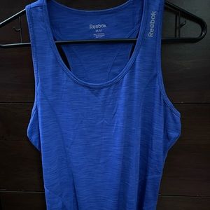 Reebok tank top.